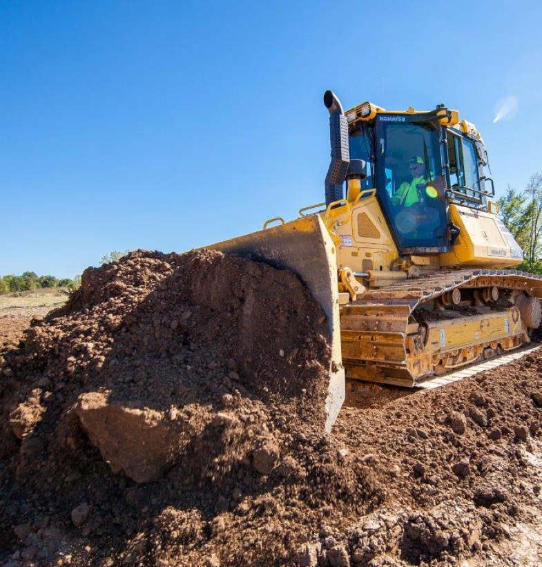 Bulldozer in action on a construction site in Ohio, available for rental from Columbus Equipment.